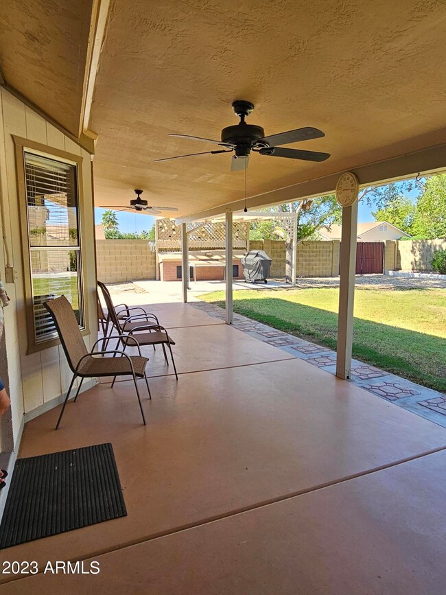 FULL LENGTH COV'D PATIO W/NEW FANS