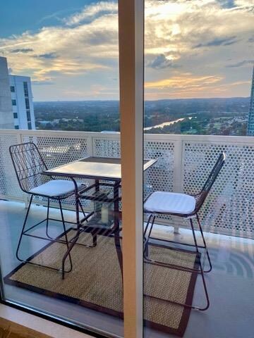View of balcony at dusk