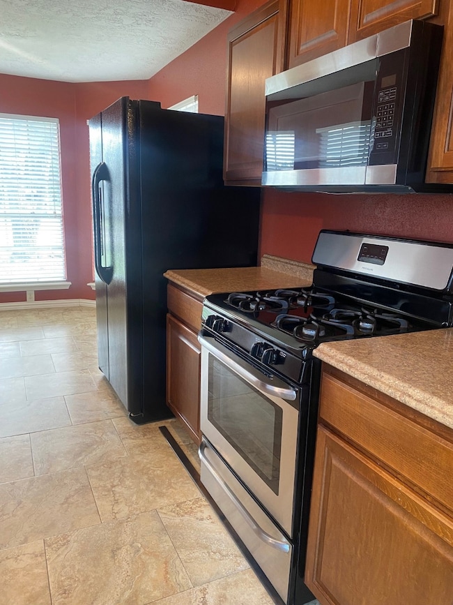 Gas stove is nice.  Refrigerator included.