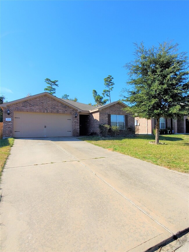12138 Estelle Ln, Pinehurst, TX 77362 - photo 2