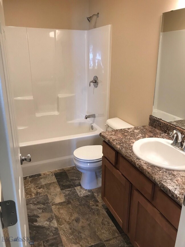 Guest bath. Photo of similar home.