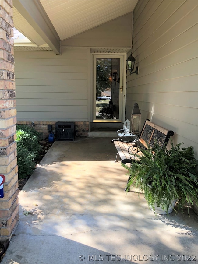 Covered porch.  The porch light comes on automatic