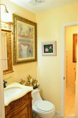 Half bath opens to the living room and entertainin