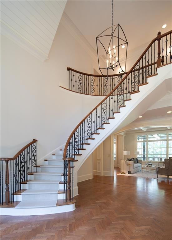 Beautiful entry featuring herringbone hardwood flo