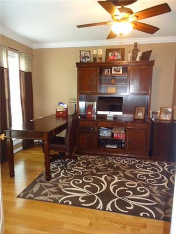 This is one side of the master bedroom that is on the main floor.  Current sellers are using this room as their office and they are using the large bedroom upstairs as the master.  This bedroom has a master bath. NICE WOOD FLOORING in this room!