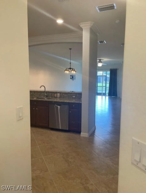 Kitchen featuring ornamental molding, visible vent