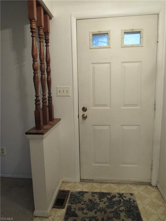Foyer area welcomes you into this town house
