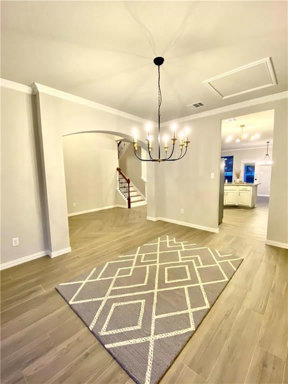 Unfurnished dining area featuring crown molding, 