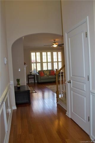 Beautiful wood flooring and wainscoting in this fo