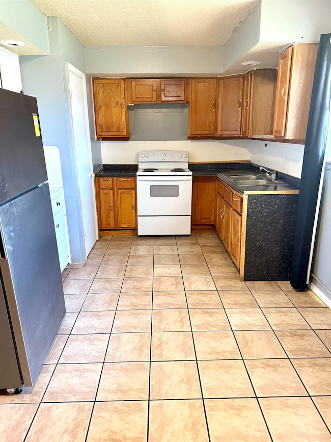 1410 N Ferguson St, Enid, OK 73701 - photo 4