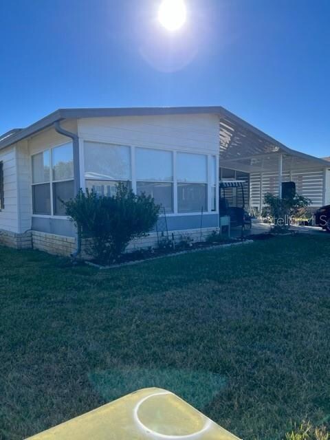 SIDE AND FRONT VIEW OF PROPERTY