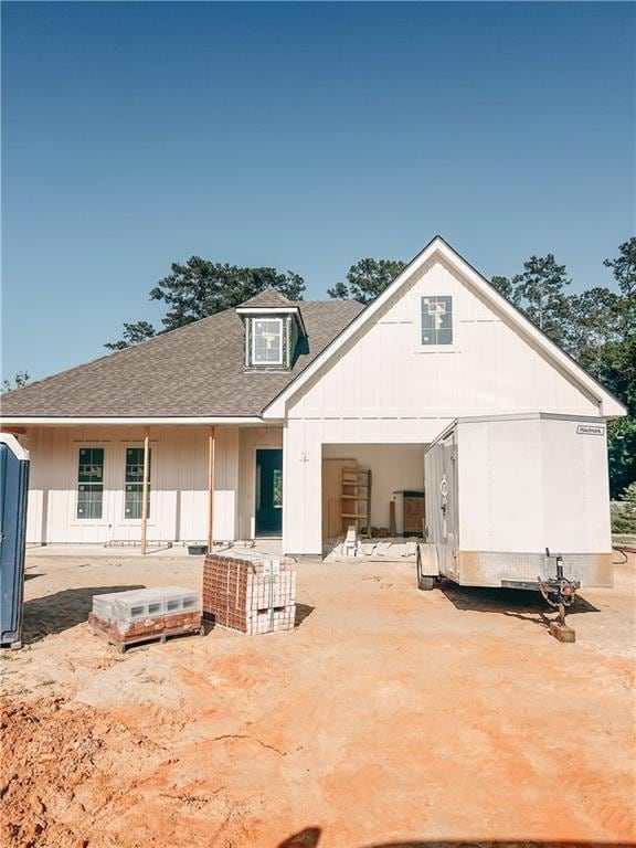 Front of house painted with SW Shoji White.