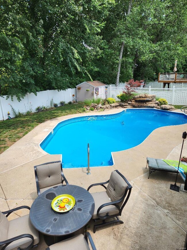 Large pool with waterfall feature
