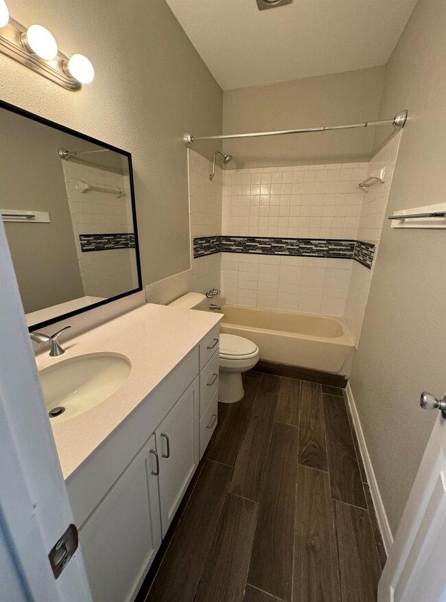 Full bathroom with bathtub / shower combination, 