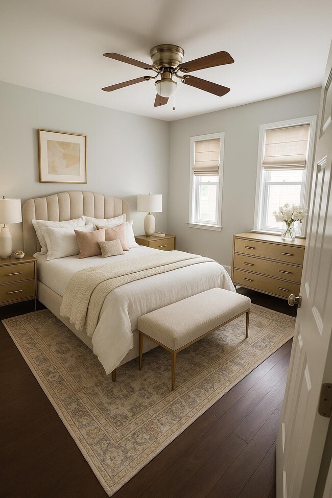 Bedroom with dark wood-type flooring and ceiling fan