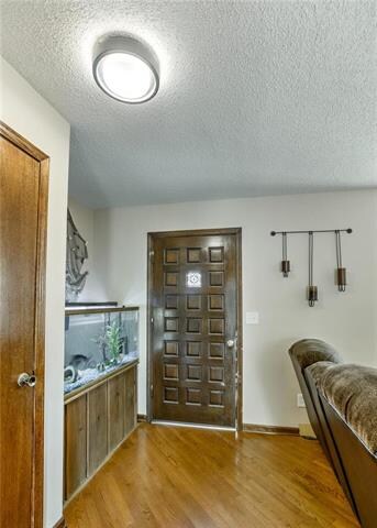 Wood floors greet you as you enter.