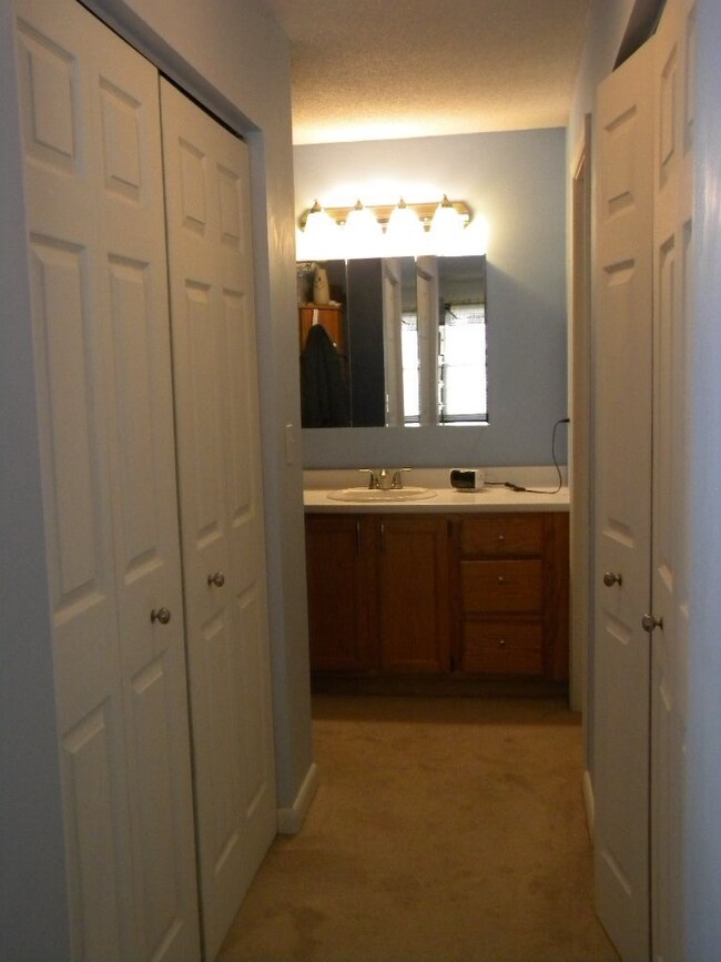 Looking down into the master bath and closet area
