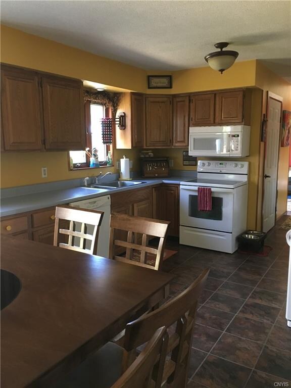 Spacious fully applianced kitchen - fridge is to t