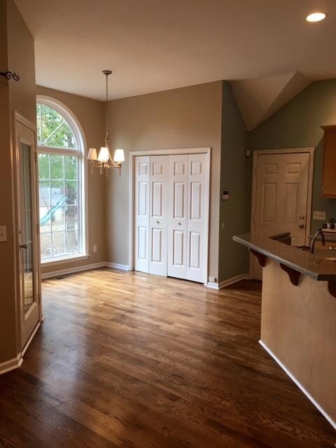Breakfast nook has plenty of natural light. Notice the beautiful site finished oak floors throughout!