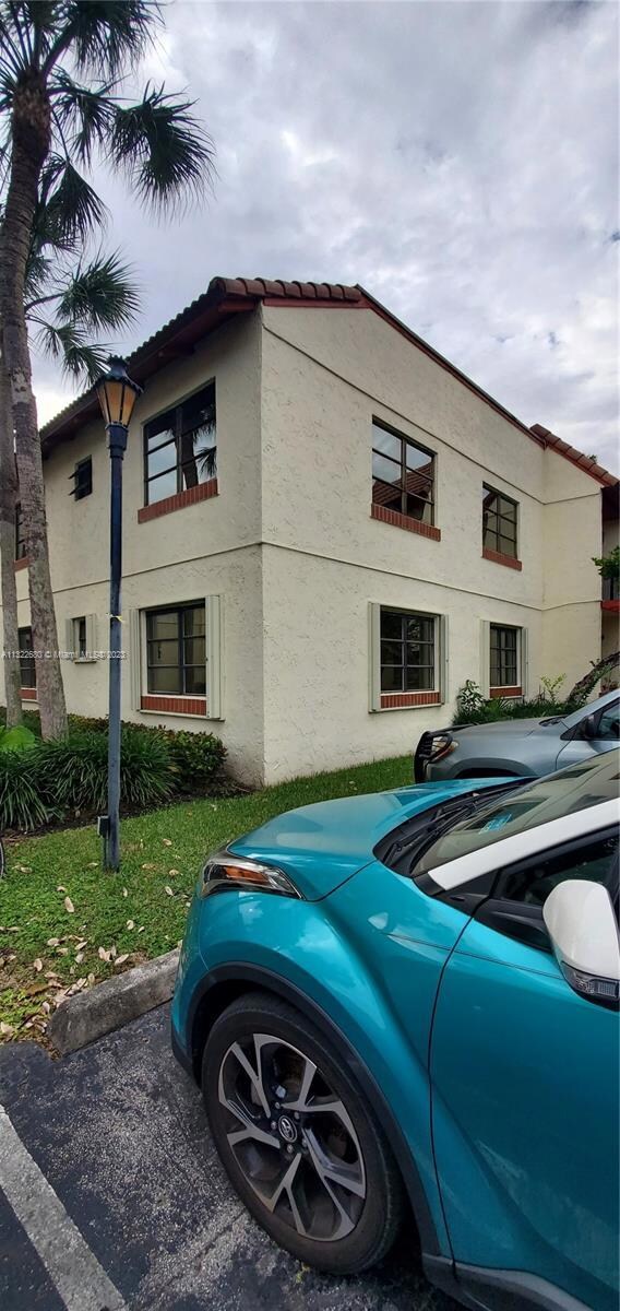 1st Floor Condo w/Accordion Shutters