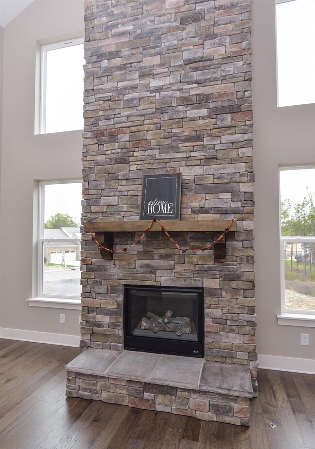 Your two story Stone Fireplace makes such a statement!