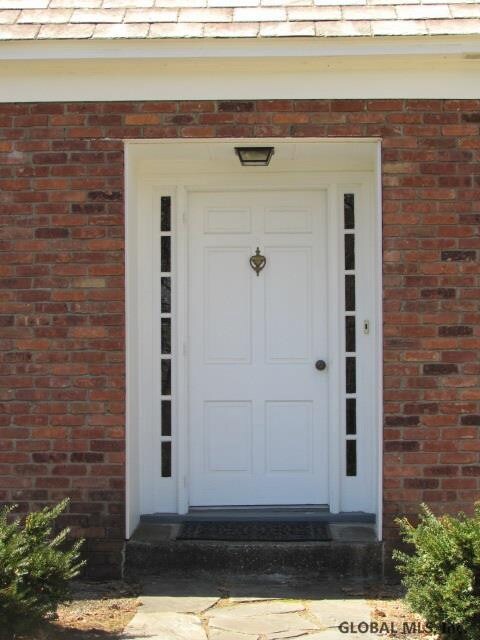 Sidelights flank the front door