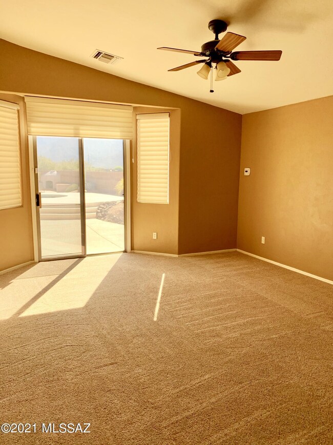 Master Bedroom with rolling Roman Shades