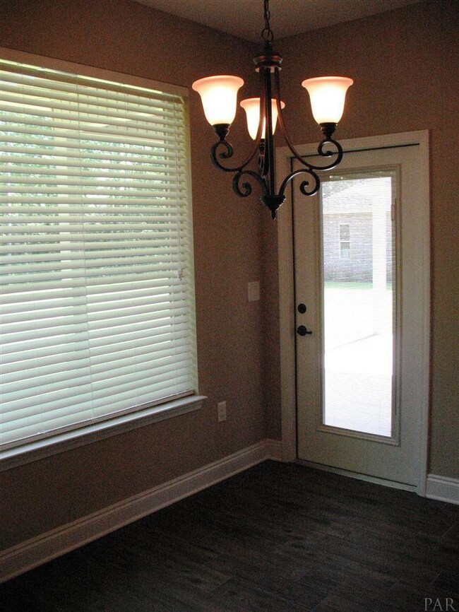 Breakfast nook has a gorgeous picture window!
