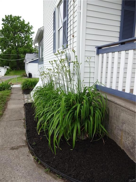 Fresh mulch and mature landscaping