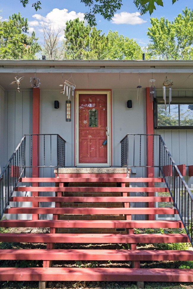 New front entry stairs create a warm welcome