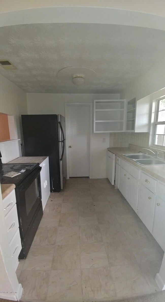 7594 Raborn Ln, Jacksonville, FL 32210 - photo 4