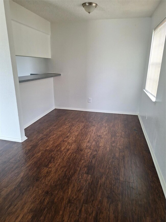 Dining opens to kitchen