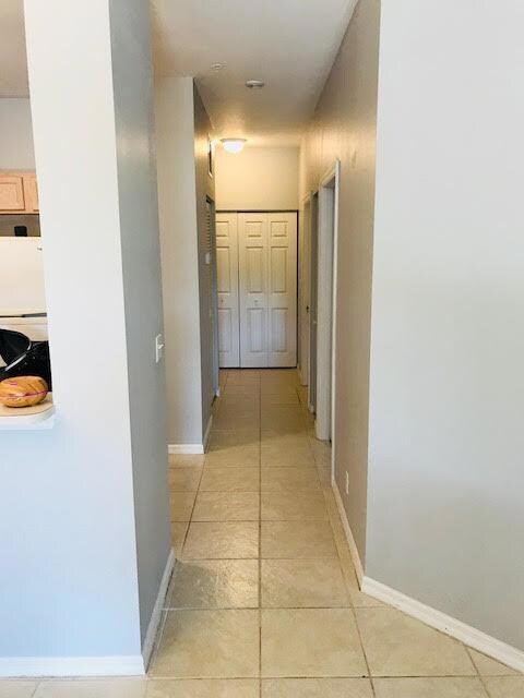 Hallway to Bedrooms/Bath/Garage