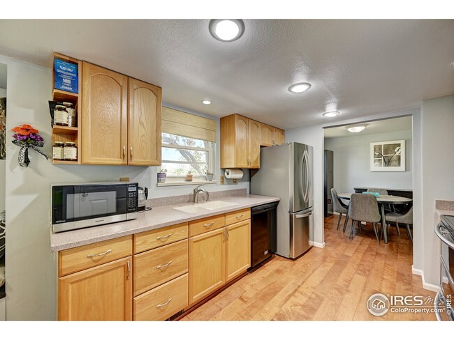 The view out the window overlooking the backyard and open space.