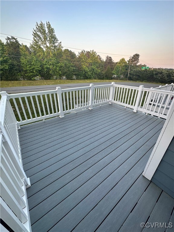View of deck at dusk