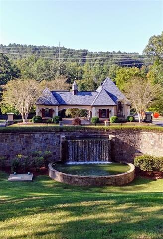 Beautiful front gate and waterfall entryway to gat