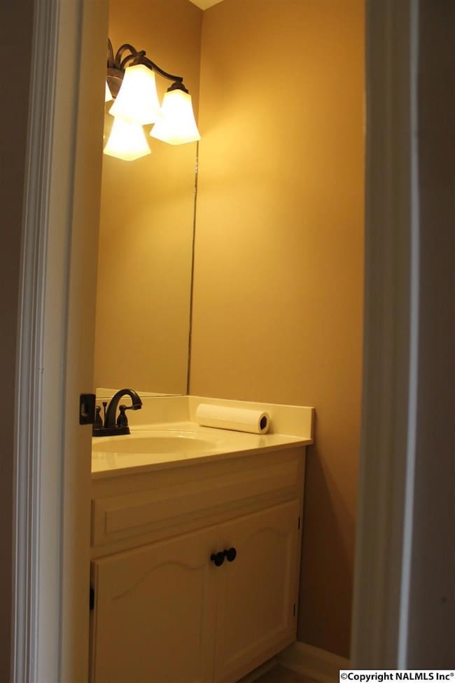 Located on the first floor between the great room and the dining room.
