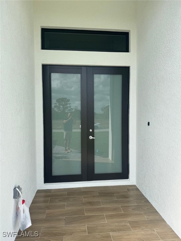 Doorway to property featuring french doors and stu
