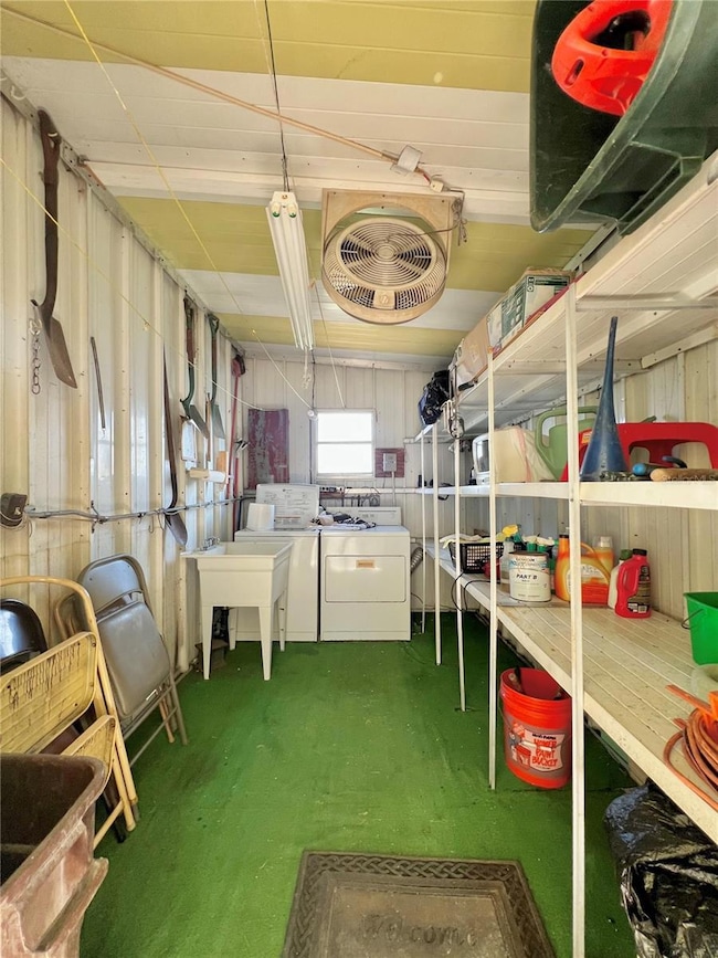 Large shed with washer and dryer as well as utility sink