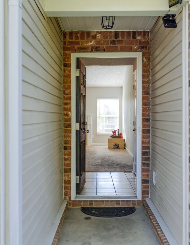 There is a clear storm door on the front to let the light in. 