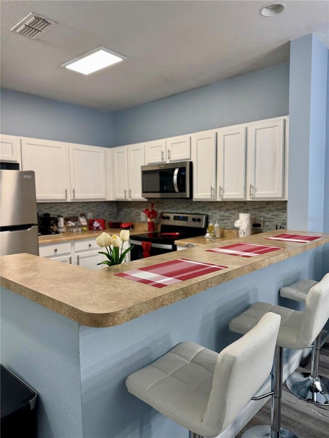 Secret Lake Resort unit 402, Kissimmee, FL 34747 - photo 3