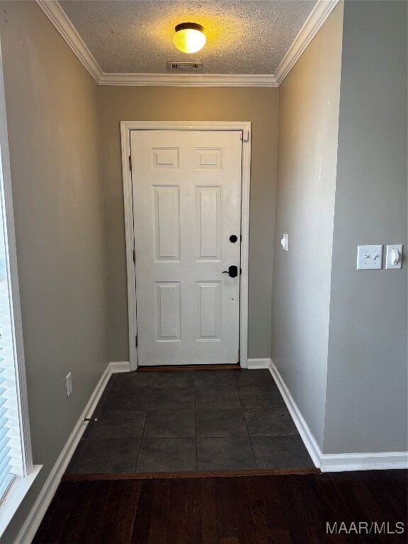Foyer/Entry with tile flooring
