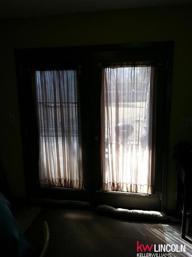 Hinged patio door entering back yard