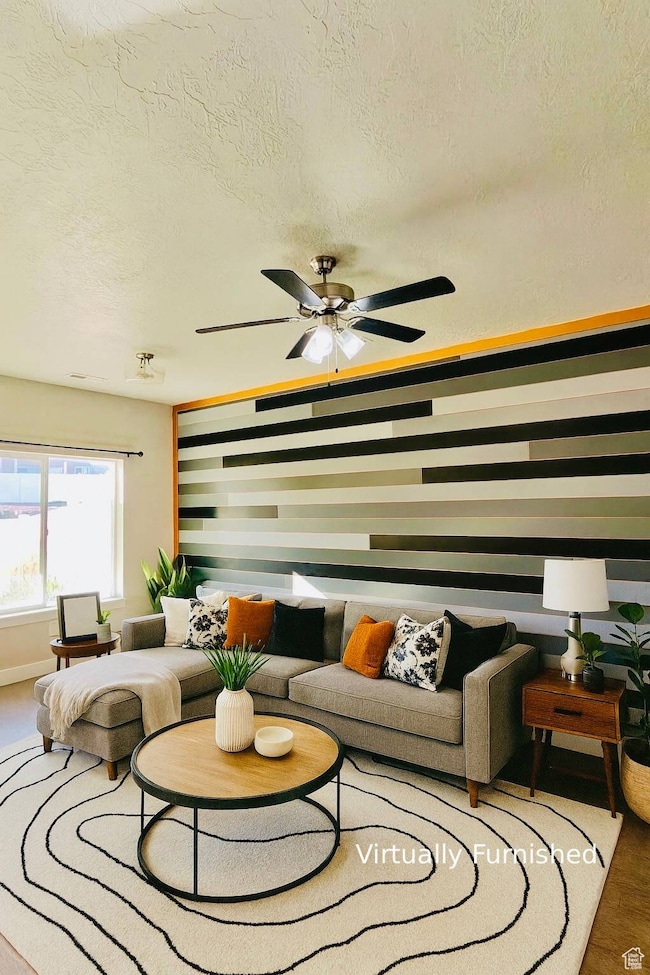 Living area featuring a textured ceiling