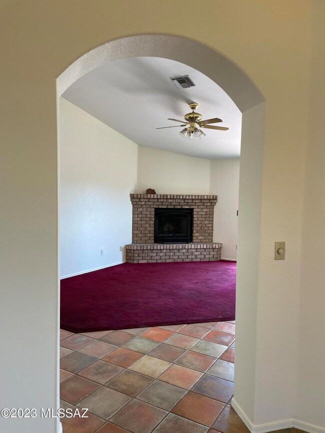 Family room with wood-burning fireplace