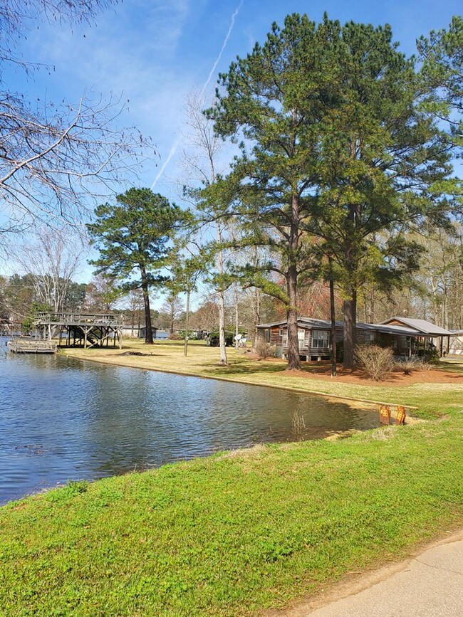 .92 acre with 311' waterfront