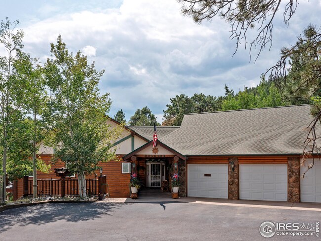 Attached 3 car garage plus 22 x 15 workshop/craft room