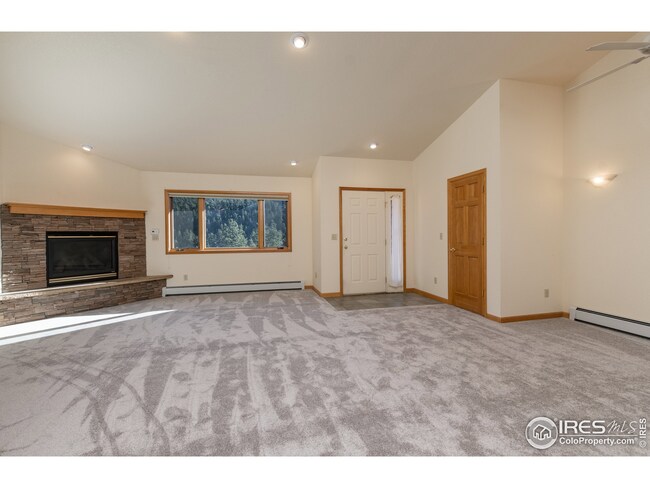 Native stone gas log fireplace