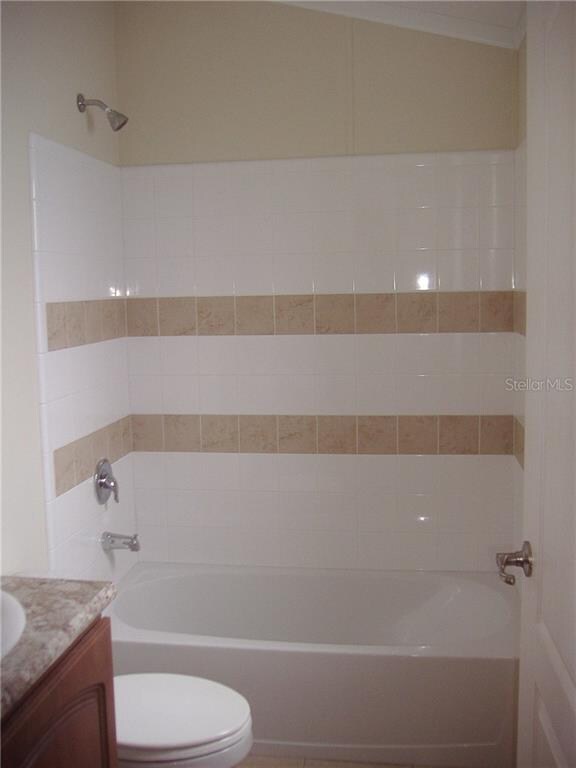 This is the New bright and shiny tiled full bath i