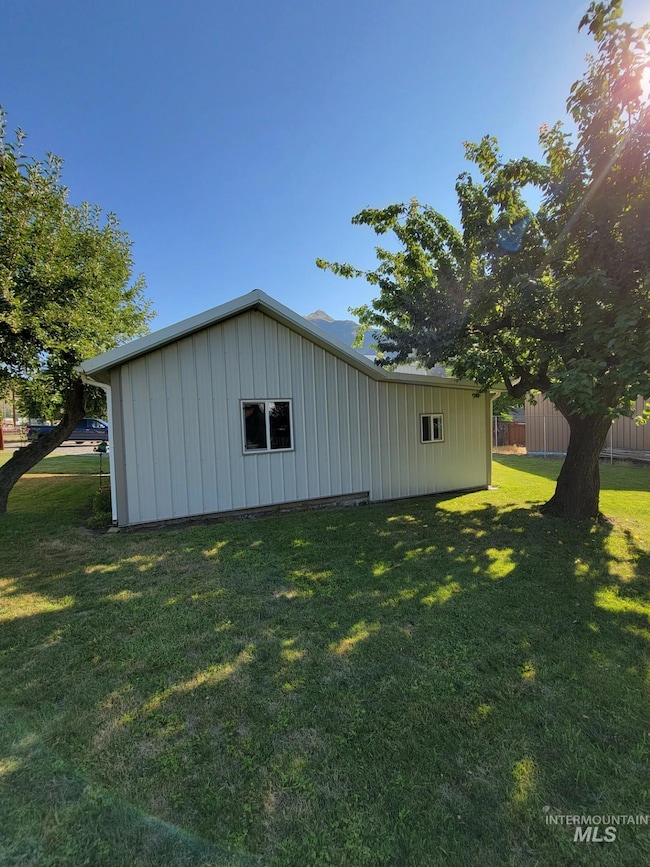 View of side of home featuring board and batten siding